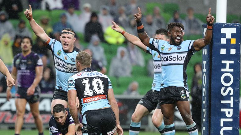 MELBOURNE, AUSTRALIA - APRIL 09:  Paul Gallen of the Sharks and his teammates celebrate after James Segeyaro of the Sharks scored the match-winning try as 