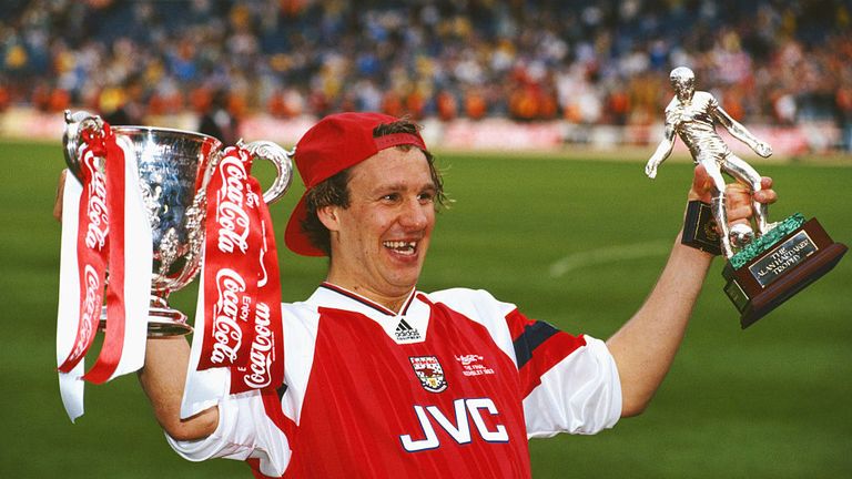 Arsenal player Paul Merson with the League Cup and man of the match trophy after the 1993 Coca-Cola Cup Final between Arsenal and Sheffield Wednesday