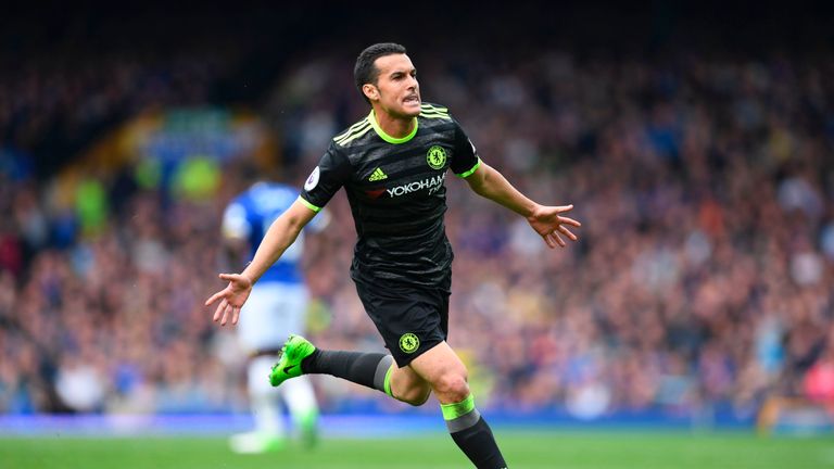 Chelsea's Spanish midfielder Pedro celebrates scoring the opening goal during the English Premier League football match between Everton and Chelsea
