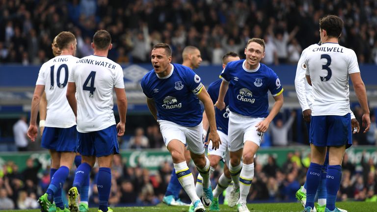 Phil Jagielka of Everton celebrates scoring Everton's third goal against Leicester