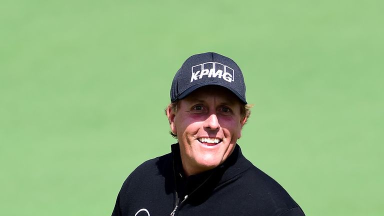 Phil Mickelson of the United States celebrates his eagle on the second hole during the first round of the 2017 Masters Tournament at Augusta