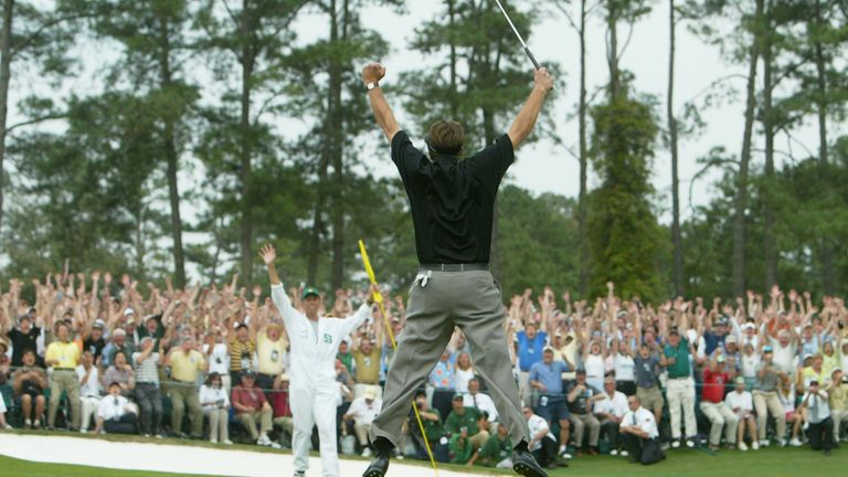 AUGUSTA, GA - APRIL 11:  Phil Mickelson  jumps in the air after sinking his birdie putt to win the Masters by one shot on the 18th green during the final r