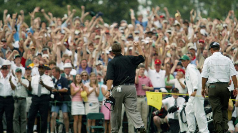 AUGUSTA, UNITED STATES:  Phil Mickelson of the US pumps his fist after his birdie putt on the 18th hole to win the Masters Golf Tournament at Augusta Natio