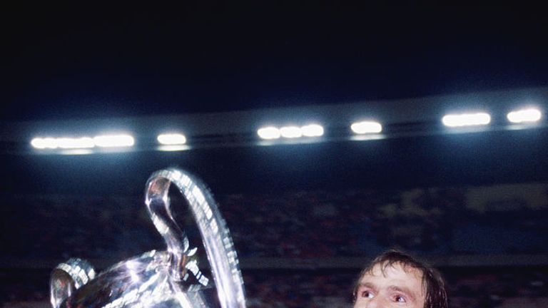 Liverpool captain Phil Thompson parades the trophy after their 1-0 victory over Real Madrid to win the 1981 European Cup Final in Paris