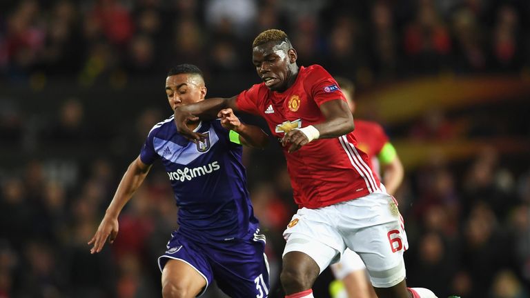 Paul Pogba of Manchester United and Youri Tielemans of RSC Anderlecht battle for the ball during the UEFA Europa League