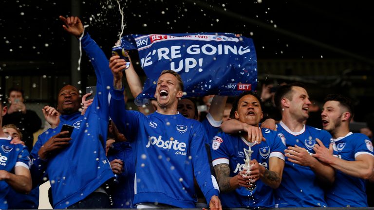 Portsmouth celebrate promotion after the Sky Bet League Two match at Meadow Lane, Nottingham