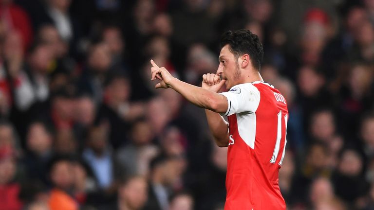 Mesut Ozil celebrates the opening goal of the game between Arsenal and West Ham United
