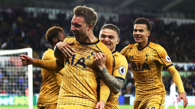 Christian Eriksen celebrates after his injury-time goal gives Tottenham a 3-1 lead