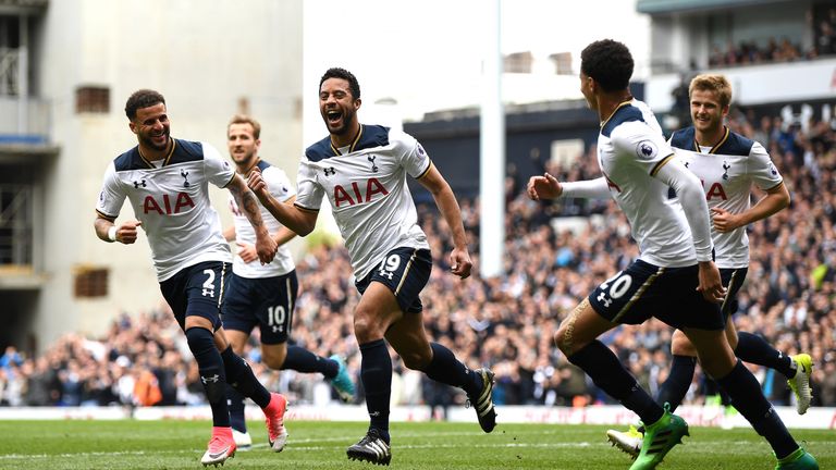 Mousa Dembele celebrates after scoring the opening goal of the game