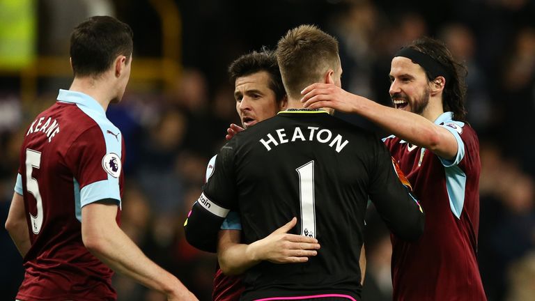 Joey Barton, Thomas Heaton of Burnley and George Boyd embrace each other after the Premier League match v Stoke