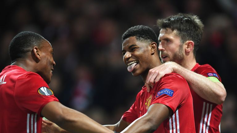 MANCHESTER, ENGLAND - APRIL 20:  Marcus Rashford of Manchester United celebrates with team mates as he scores their second goal during the UEFA Europa Leag