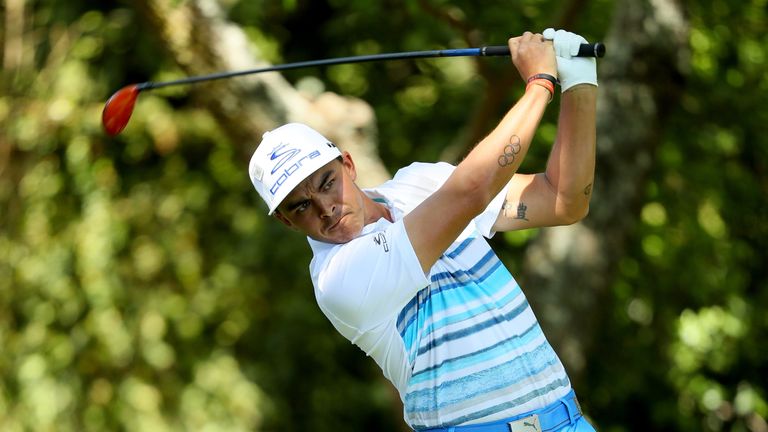 Rickie Fowler of the United States plays his shot from the second tee during the third round of the 2017 Masters Tournament at Aug