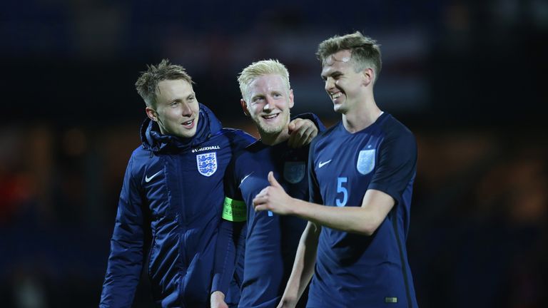 RANDERS, DENMARK - MARCH 27:  (L-R) Cauley Woodrow, Will Hughes and Rob Holding of England smile after victory in the U21 international friendly match betw