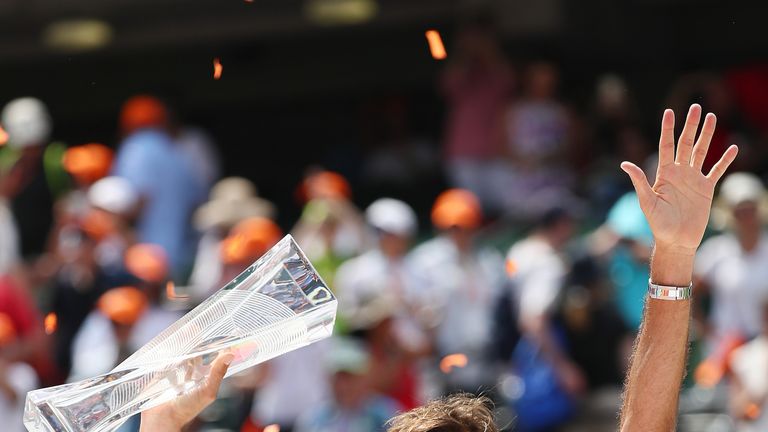 KEY BISCAYNE, FL - APRIL 02:  Roger Federer of Switzerland holds the winner's trophy after defeating  Rafael Nadal of Spain during the Men's Final and day 