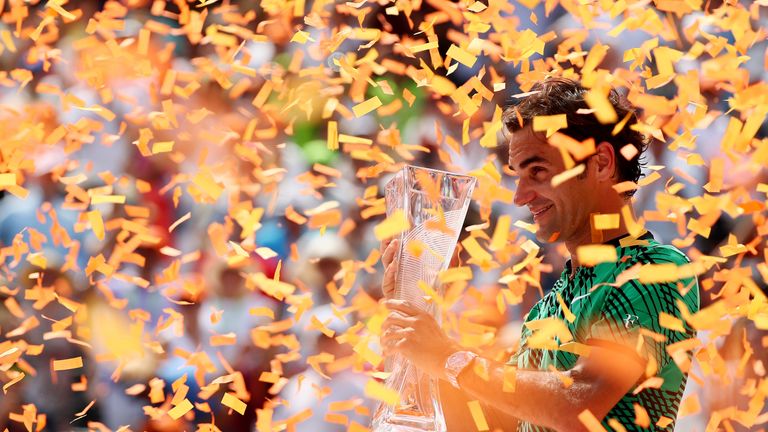 KEY BISCAYNE, FL - APRIL 02:  Roger Federer of Switzerland holds the winner's trophy after defeating  Rafael Nadal of Spain during the Men's Final and day 