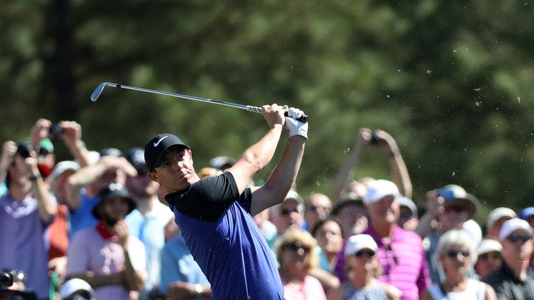 Rory McIlroy of Northern Ireland plays a shot on the a tee during a practice round prior to the start of the 2017 Masters Tournament