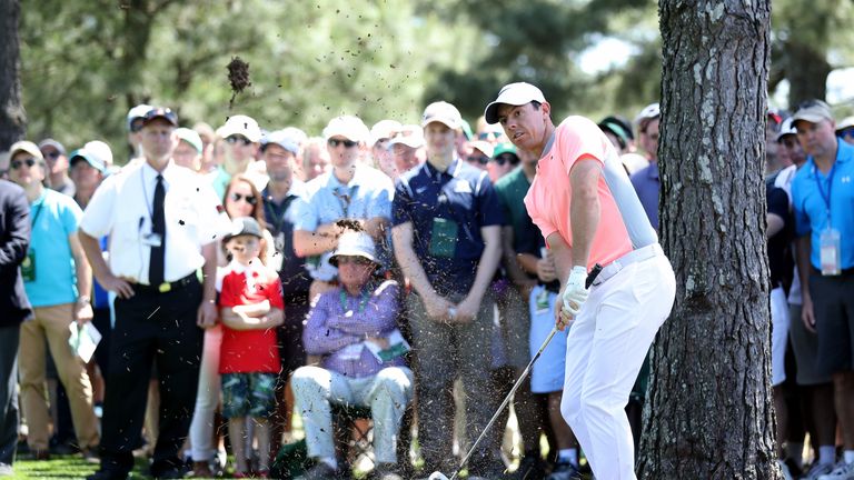 Rory McIlroy got off to a rocky start with a drive into trees at the first