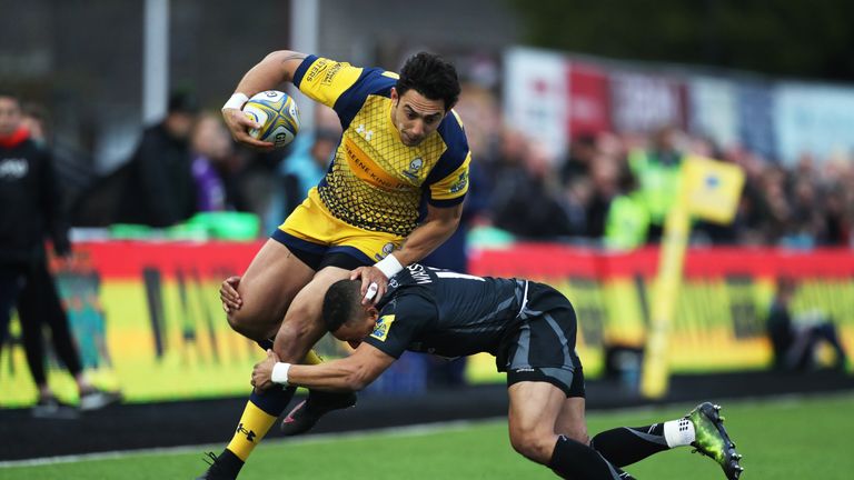 Worcester's Bryce Heem is tackled by Marcus Watson