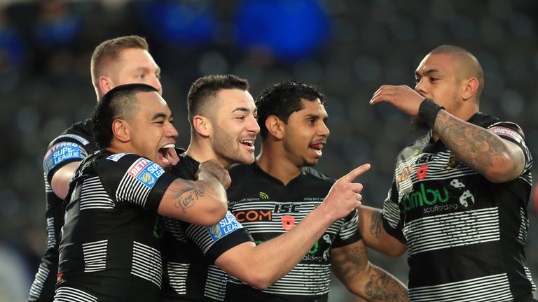 Connor (centre) celebrates scoring Hull's first try