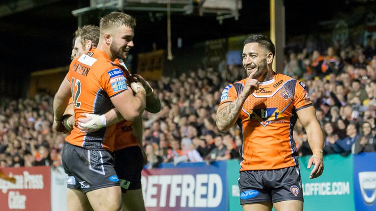 Castleford's Joel Monaghan celebrates his try with Mike McMeeken and Rangi Chase