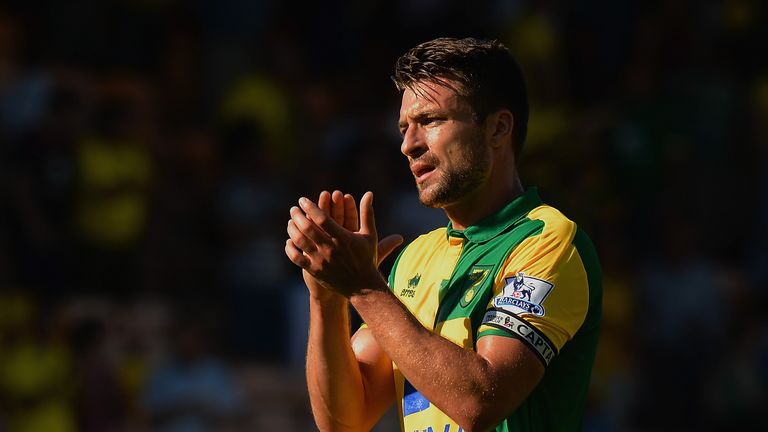 Russel Martin of Norwich City applauds the crowd