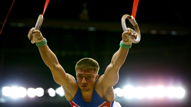 Sam Oldham competes on the Rings at the World Cup of Gymnastics