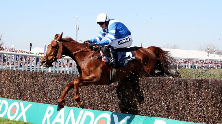 San Benedeto ridden by jockey Nick Scholfield on the way to winning the Doom Bar Maghull Novices' Chase on Grand National Day of the Randox Health Grand Na