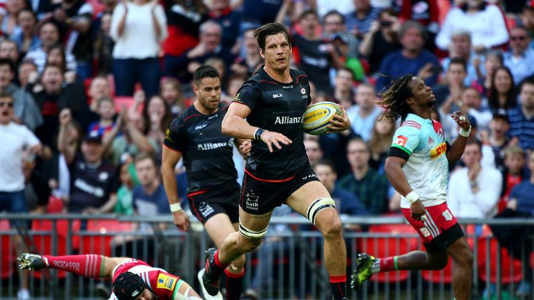 Saracens Michael Rhodes breaks through to score the teams third try at Wembley