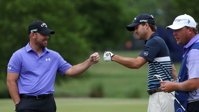 AVONDALE, LA - APRIL 30: Scott Brown and Kevin Kisner react to their putt on the fifth hole during the final round of the Zurich Classic at TPC Louisiana o