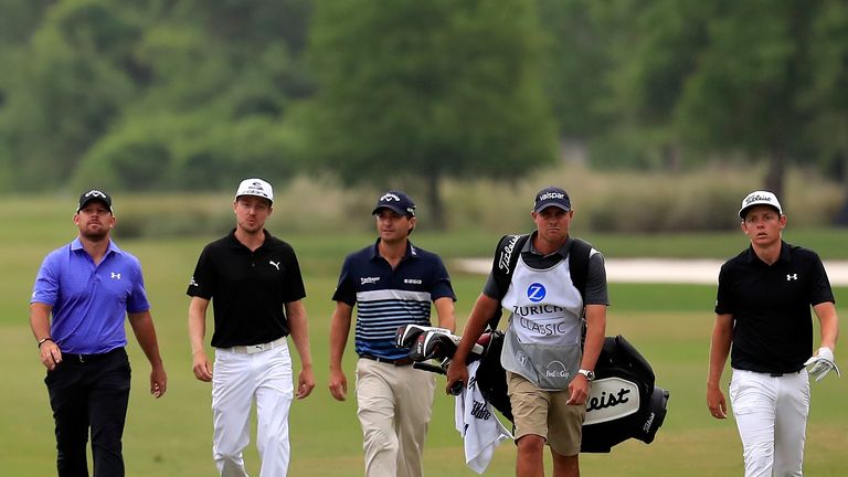 AVONDALE, LA - APRIL 30: The group of Scott Brown and Kevin Kisner and Jonas Blixt of Sweden and Cameron Smith of Australia walk up the second fairway duri