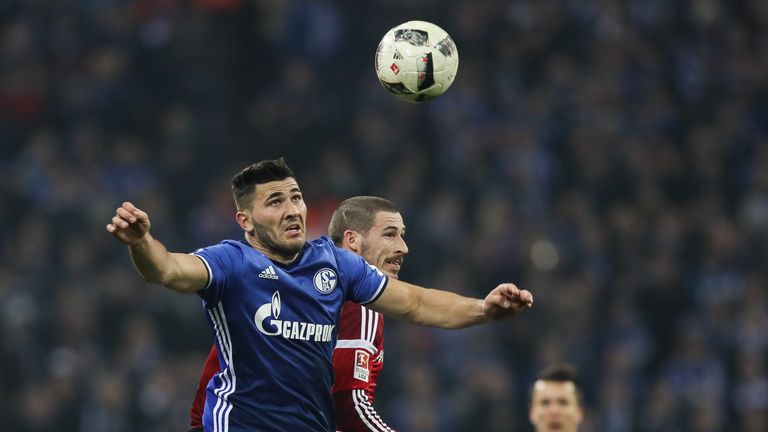 GELSENKIRCHEN, GERMANY - JANUARY 21: Sead Kolasinac of Schalke (L) and Mathew Leckie of Ingolstadt fight for the ball during the Bundesliga match between F