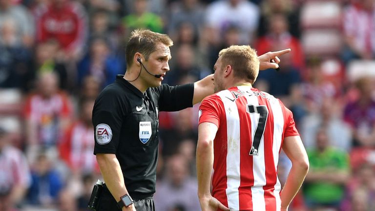 Sebastian Larsson of Sunderland is sent off by referee Craig Pawson for a challenge on Ander Herrera