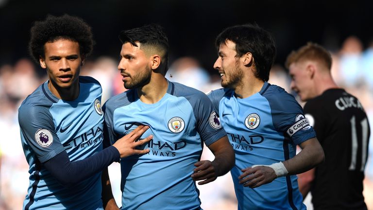 MANCHESTER, ENGLAND - APRIL 08:  Sergio Aguero of Manchester City celebrates scoring his sides second goal with Leroy Sane of Manchester City and David Sil