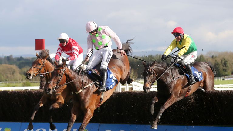 Jockey Robbie Power on board Sizing John (right) goes on to win the Coral Punchestown Gold Cup during day two of the Punchestown Festival in Naas, Co. Kild