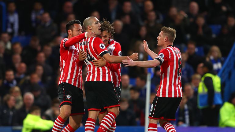 Oriol Romeu of Southampton (14) celebrates as he scores their first goal with team mates during the Premier League match between Chelsea and Southampton
