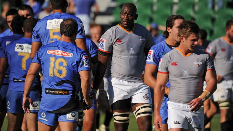 Players leave the field following the Super Rugby match between Australias Western Force and South Africas Kings in Perth on April 9, 2017. / AFP PHOTO / G