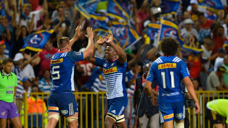 Sikhumbuzo Notshe and Chris van Zyl of the Stormers celebrate after beating the Chiefs