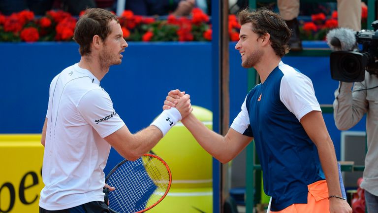 British tennis player Andy Murray (L) greets Austrian tennis player Dominic Thiem during the ATP Barcelona Open