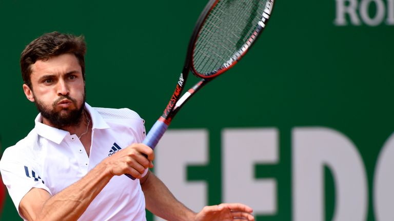 French's Gilles Simon hits a return to Serbia's Novak Djokovic French's Gilles Simon during the Monte-Carlo ATP Masters Series tournament