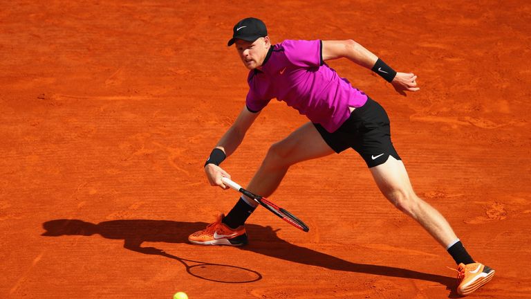 Kyle Edmund of Great Britain plays a forehand against Rafael Nadal of Spain in his second round match