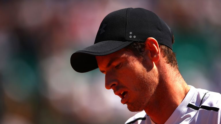 Andy Murray of Great Britain looks dejected during his third round match against Albert Ramos-Vinolas