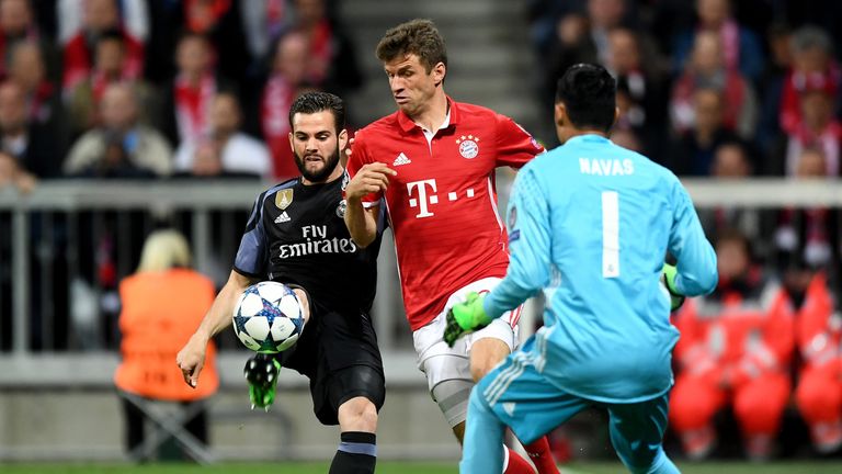 Thomas Muller challenges for the ball in front of Keylor Navas