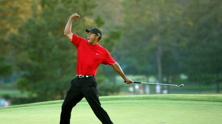 AUGUSTA, GA - APRIL 10:  Tiger Woods celebrates after sinking a putt on the first playoff hole to win the 2005 Masters on April 10, 2005 at Augusta Nationa