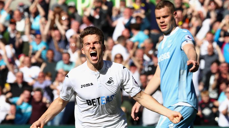 Tom Carroll says Swansea will fight to the bitter end in their battle for survival