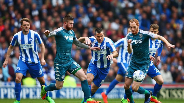 Tomer Hemed is closed by Ryan Tunnicliffe (L) and Shaun MacDonald