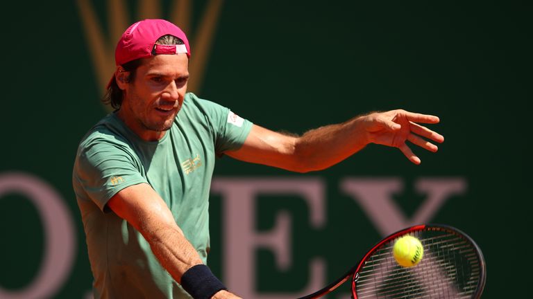 MONTE-CARLO, MONACO - APRIL 18:  Tommy Haas of Germany plays a backhand against Benoit Paire of France in his first round match on day three of the Monte C