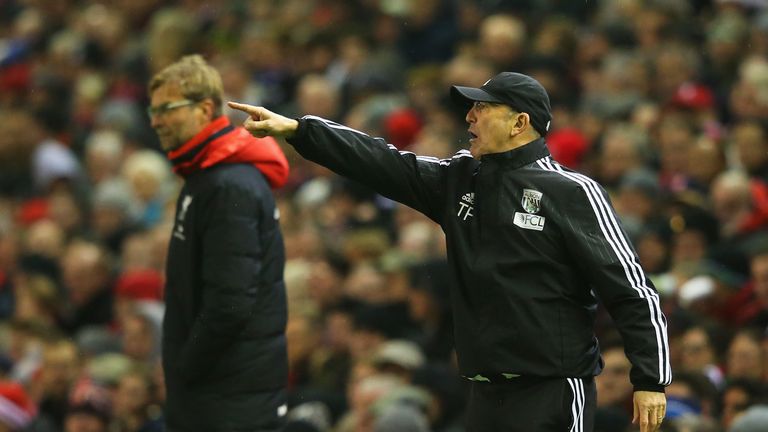 Tony Pulis, manager of West Bromwich Albion and Jurgen Klopp, manager of Liverpool