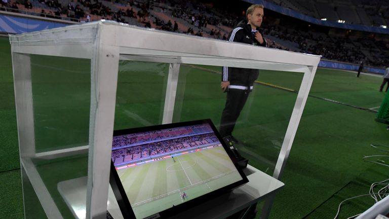 The video assistant referee system is placed beside the pitch prior to the Club World Cup semi-final