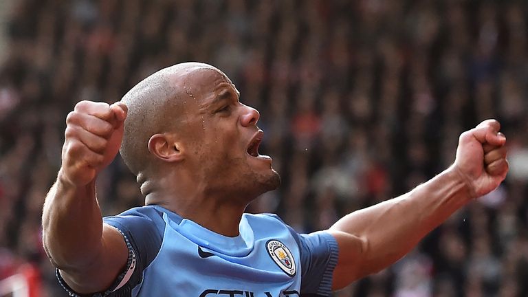 Vincent Kompany celebrates after scoring the opening goal of the game Southampton