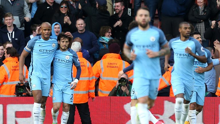 Manchester City's Vincent Kompany (left) celebrates scoring his side's first goal of the game during the Premier League match at Southampton